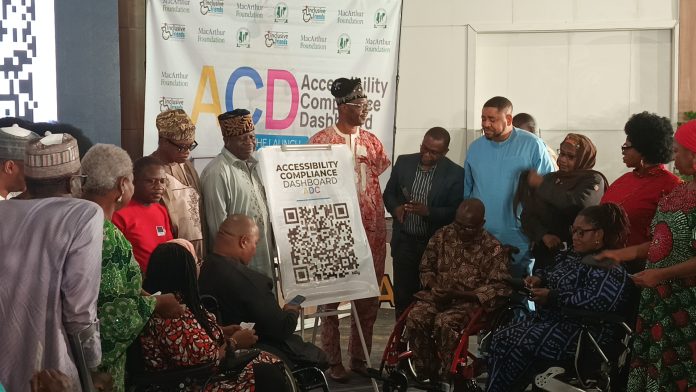 A cross section of Dignitaries after unveiling of the dashboard